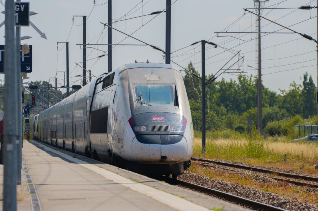 A high-speed SNCF train arriving at Dol-de-Bretagne station, Brittany, France.